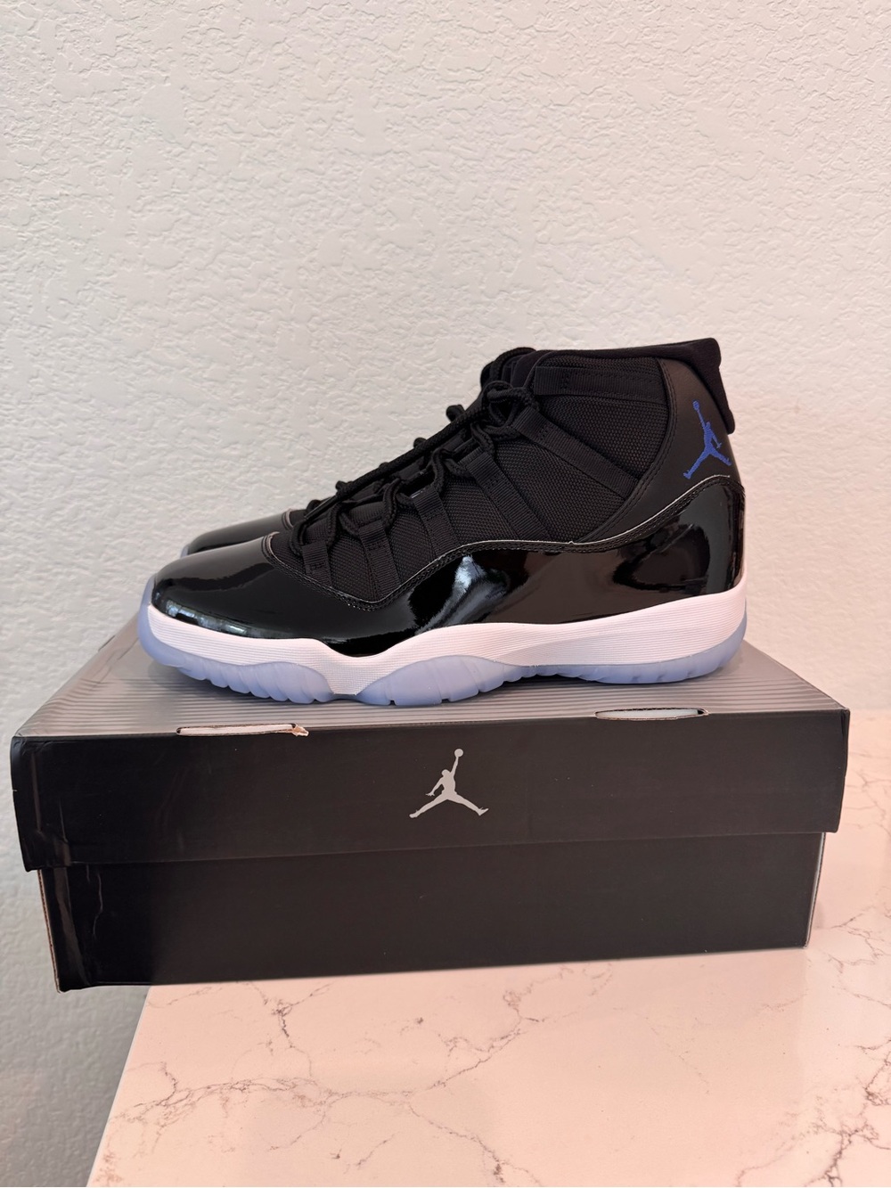 Jordan 11 “Space Jam” 2026 Men's High-Top Sneakers in Black with Blue Logo